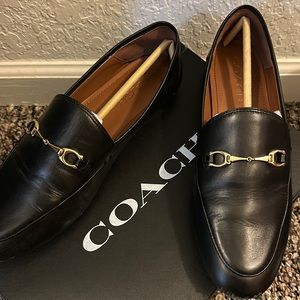 Black leather COACH loafers